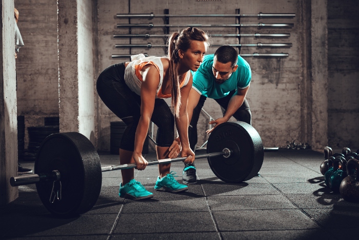 what to consider when hiring a personal trainer